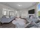 Spacious living room featuring a fireplace, comfortable seating, and plenty of natural light at 1042 Cardross St, Burlington, NC 27215
