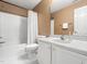Bathroom featuring a combination shower and tub with a white shower curtain, as well as a single sink vanity at 10436 Cokesbury Ln, Raleigh, NC 27614