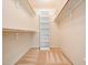 Spacious walk-in closet with built-in shelving, perfect for organization at 10436 Cokesbury Ln, Raleigh, NC 27614