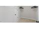 Walk-in closet with shelving for efficient organization of clothes and accessories at 105 Blue Prince Trl, Holly Springs, NC 27540