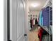 Walk-in closet with wire rack shelving providing ample storage space for clothing and accessories at 105 Blue Prince Trl, Holly Springs, NC 27540