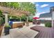 Beautiful backyard features a pergola, hot tub, and outdoor seating area at 10523 Bedfordtown Dr, Raleigh, NC 27614