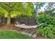 Relax in a shady hammock nestled in the backyard at 10523 Bedfordtown Dr, Raleigh, NC 27614