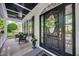 Charming front entrance with stylish door, elegant wreath, and a welcoming entrance mat at 10523 Bedfordtown Dr, Raleigh, NC 27614