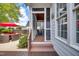 Inviting screened porch with wood ceiling provides a cozy outdoor living space at 10523 Bedfordtown Dr, Raleigh, NC 27614