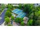 Aerial shot of community tennis courts with playground and parking area at 10523 Bedfordtown Dr, Raleigh, NC 27614