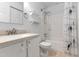 Clean bathroom featuring a tub and shower combo, and vanity with ample counter space at 11 Providence Ct, Durham, NC 27705