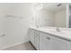 Bathroom features double sinks, white cabinets, a large mirror, and a shower at 110 Cribbs Ln, Middlesex, NC 27557