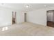 Large main bedroom provides neutral carpet and access to both the main bathroom and the main bedroom closet at 110 Cribbs Ln, Middlesex, NC 27557