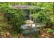 Inviting back deck with umbrella-covered dining set, perfect for outdoor relaxation and entertaining at 11009 Eaglerock Dr, Raleigh, NC 27613
