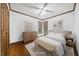Bright and airy bedroom with natural light, hardwood floors, and a neutral color palette at 11009 Eaglerock Dr, Raleigh, NC 27613