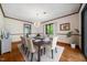 Inviting dining room complete with wood floors and a chandelier, perfect for gatherings at 11009 Eaglerock Dr, Raleigh, NC 27613