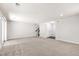 Spacious finished basement with neutral carpet, white trim, recessed lighting, and sliding glass door to backyard at 1101 Boxcar Way, Apex, NC 27502