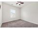 Bedroom featuring a window, ceiling fan and carpeted floor at 1101 Boxcar Way, Apex, NC 27502