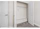 Bedroom closet featuring carpeted floor and wire shelving units at 1101 Boxcar Way, Apex, NC 27502