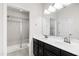 Updated main bathroom with double sink vanity and enclosed glass shower at 1101 Boxcar Way, Apex, NC 27502
