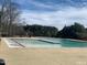 Community pool with spacious deck area for lounging and recreation at 1101 Boxcar Way, Apex, NC 27502