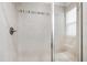 Beautifully tiled enclosed shower with a window offers natural light at 1101 Boxcar Way, Apex, NC 27502