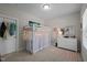Bright bedroom includes a bunk bed, white dresser, and decorative mirror for a stylish and functional space at 1103 Capstone Dr, Durham, NC 27713
