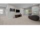 Cozy bonus room featuring a tv, dartboard, and comfortable beanbag chair for relaxation and entertainment at 1103 Capstone Dr, Durham, NC 27713