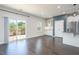 Open kitchen and dining area with sliding glass doors leading to outdoor deck at 114 Cross Country Way, Durham, NC 27703