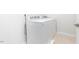 Bright laundry room featuring white washer and dryer at 114 Cross Country Way, Durham, NC 27703
