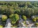 An aerial view showcases the neighborhood, with green trees surrounding the complex at 117 Candace Pl, Cary, NC 27513