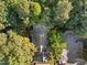 An aerial view showcasing the property's roof and its surrounding treed neighborhood at 117 Candace Pl, Cary, NC 27513