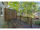 This home boasts a wooden back deck overlooking mature trees and surrounding properties at 117 Candace Pl, Cary, NC 27513