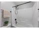 Bathroom with white tub and bronze fixture at 117 Woodlark Ln, Holly Springs, NC 27540