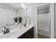 Bathroom with double sink vanity and combined shower and tub at 117 Woodlark Ln, Holly Springs, NC 27540