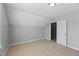 Spacious bedroom with neutral walls and carpet at 117 Woodlark Ln, Holly Springs, NC 27540