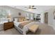 Spacious main bedroom offers natural light, complemented by neutral tones and comfortable furnishings at 117 Woodlark Ln, Holly Springs, NC 27540