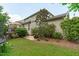 Beautiful backyard featuring a deck, lush greenery, and a trampoline at 1401 Everette Fields Rd, Morrisville, NC 27560