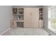 Bright room with built-in shelving, desk area and a murphy bed at 1401 Everette Fields Rd, Morrisville, NC 27560