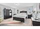 Spacious bedroom with ample natural light and elegant furniture, creating a serene atmosphere at 1448 Big Falls Dr, Wendell, NC 27591