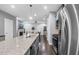 Open kitchen with stainless steel appliances and granite countertops, ideal for cooking and entertaining at 1448 Big Falls Dr, Wendell, NC 27591