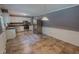 Spacious kitchen featuring stainless steel appliances, tile flooring, and ample cabinet space at 1509 Logan St, Durham, NC 27704