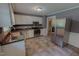 Updated kitchen with stainless steel appliances, ample counter space, and modern finishes at 1509 Logan St, Durham, NC 27704