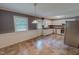 Open kitchen layout with stainless steel appliances, bright lighting, and ample counter space at 1509 Logan St, Durham, NC 27704