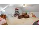 Spacious bedroom with a cozy armchair, ceiling fan and lots of space for comfortable seating at 151 Donnibrook, Fuquay Varina, NC 27526