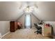Bedroom with neutral colored carpet, gray walls, ceiling fan, window, dresser, and desk at 151 Donnibrook, Fuquay Varina, NC 27526