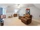 Bedroom with neutral colored carpet, ceiling fan, recliner, and a toy area at 151 Donnibrook, Fuquay Varina, NC 27526