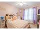 Bedroom with a window, bed, soft lighting, and decor at 151 Donnibrook, Fuquay Varina, NC 27526