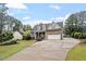 Beautiful two-story home featuring a well-maintained yard, driveway, and attached garage at 151 Donnibrook, Fuquay Varina, NC 27526