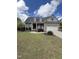 Well-maintained lawn enhances this charming home's curb appeal and invites you inside at 151 Donnibrook, Fuquay Varina, NC 27526