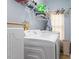 Cozy laundry room offering shelving and full-size, front-load appliances at 151 Donnibrook, Fuquay Varina, NC 27526