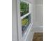 Bright bathroom featuring a window and white walls at 1522 Goodwin Rd, Durham, NC 27712