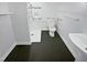 Bright bathroom with large shower and safety bars at 1522 Goodwin Rd, Durham, NC 27712