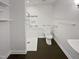 Bright bathroom with large shower and safety bars at 1522 Goodwin Rd, Durham, NC 27712